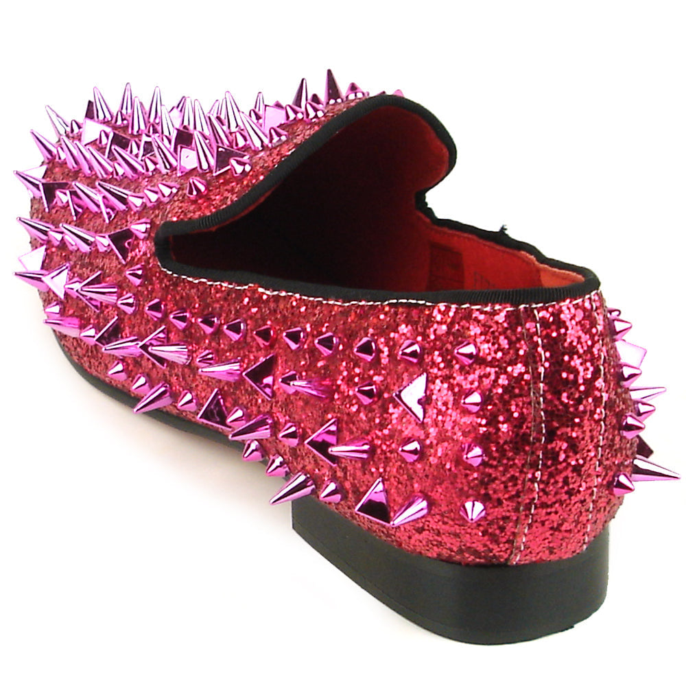 The FI-7239 Rose Glitter Rose Spikes Slip on Loafer by Fiesso features hand-crafted pink glittery leather, striking pointed metallic spikes, and a black sole—a bold, standout choice in men’s fashion.