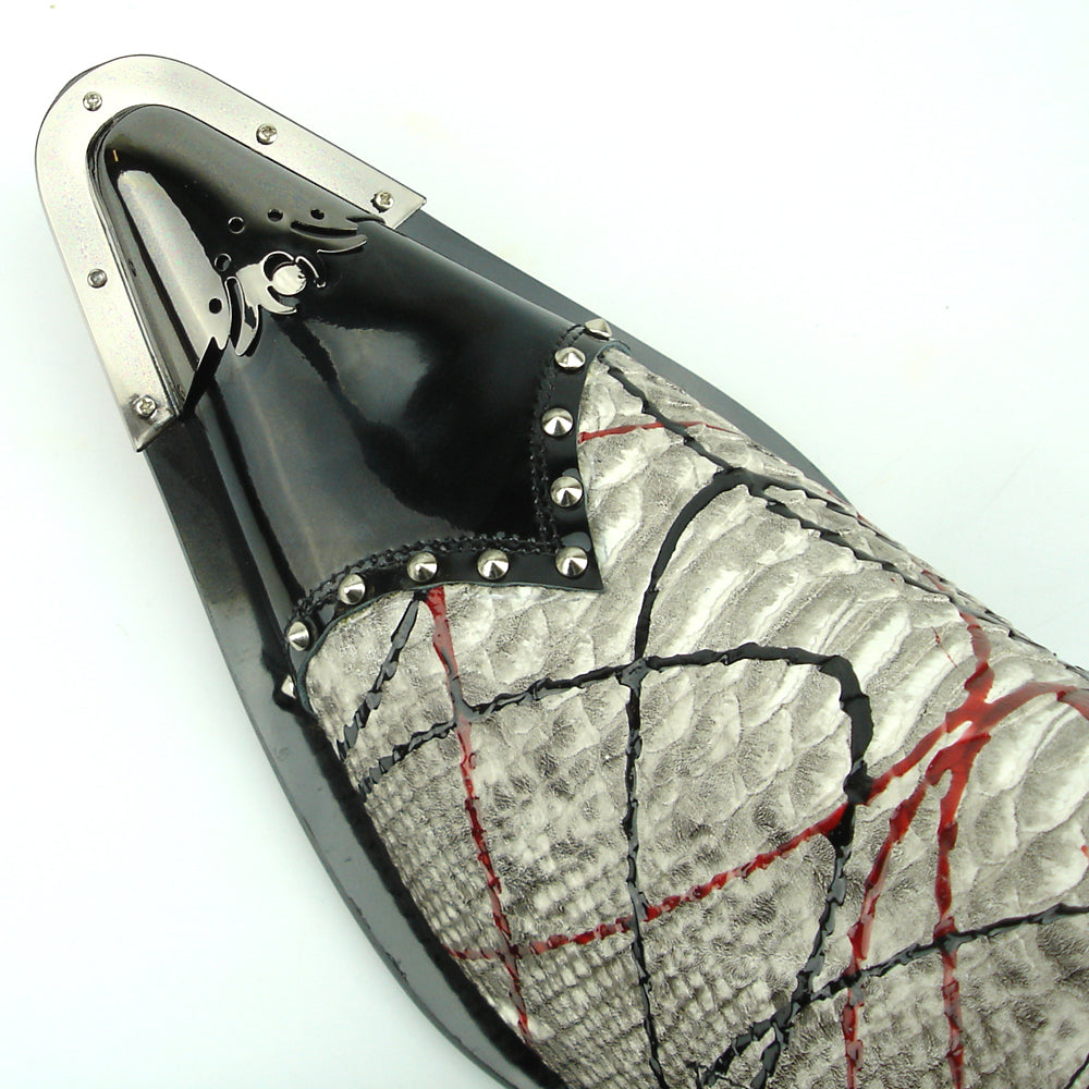 The FI-7370 Multi Black Leather Slip-on by Fiesso features a snakeskin pattern, black patent accents, metal toe cap, and studded edges—boldly redefining men's fashion shoes with standout elegance.