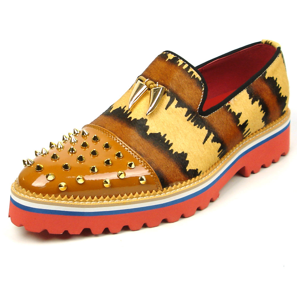 The FI-7455 Brown Cap Toe Spikes Slip On by Fiesso features gold spikes on a brown toe, animal print sides, red interior and sole, plus a bold blue stripe—a striking, handcrafted leather loafer for standout men’s style.