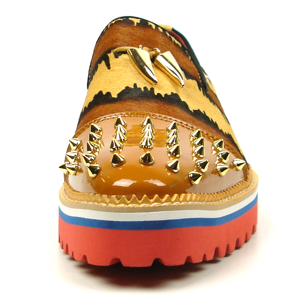 The FI-7455 Brown Cap Toe Spikes Slip On by Fiesso features gold spikes on a brown toe, animal print sides, red interior and sole, plus a bold blue stripe—a striking, handcrafted leather loafer for standout men’s style.