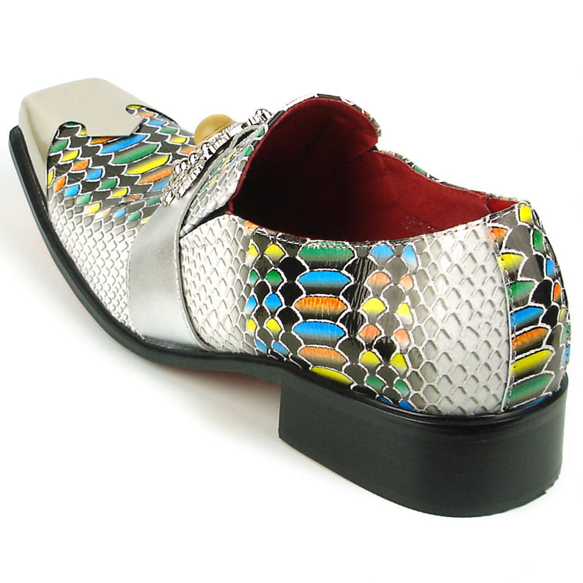 Introducing the Fiesso FI-7512 White Multicolor Snake Print Metal Tip—a men’s dress shoe that features a striking multicolored snakeskin pattern, metallic silver accents including a stylish metal tip, and a pointed square toe. Expertly crafted by Fiesso, these standout shoes are perfect for those seeking bold and fashionable men’s footwear.
