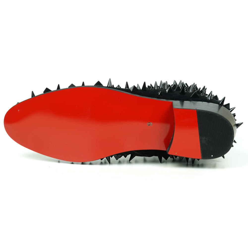 The FI-7527-S Black Suede Black Spikes Boot by Fiesso is a men's ankle boot featuring black suede, numerous black spikes, and a red-and-black pull tab—an edgy statement piece crafted from premium leather.