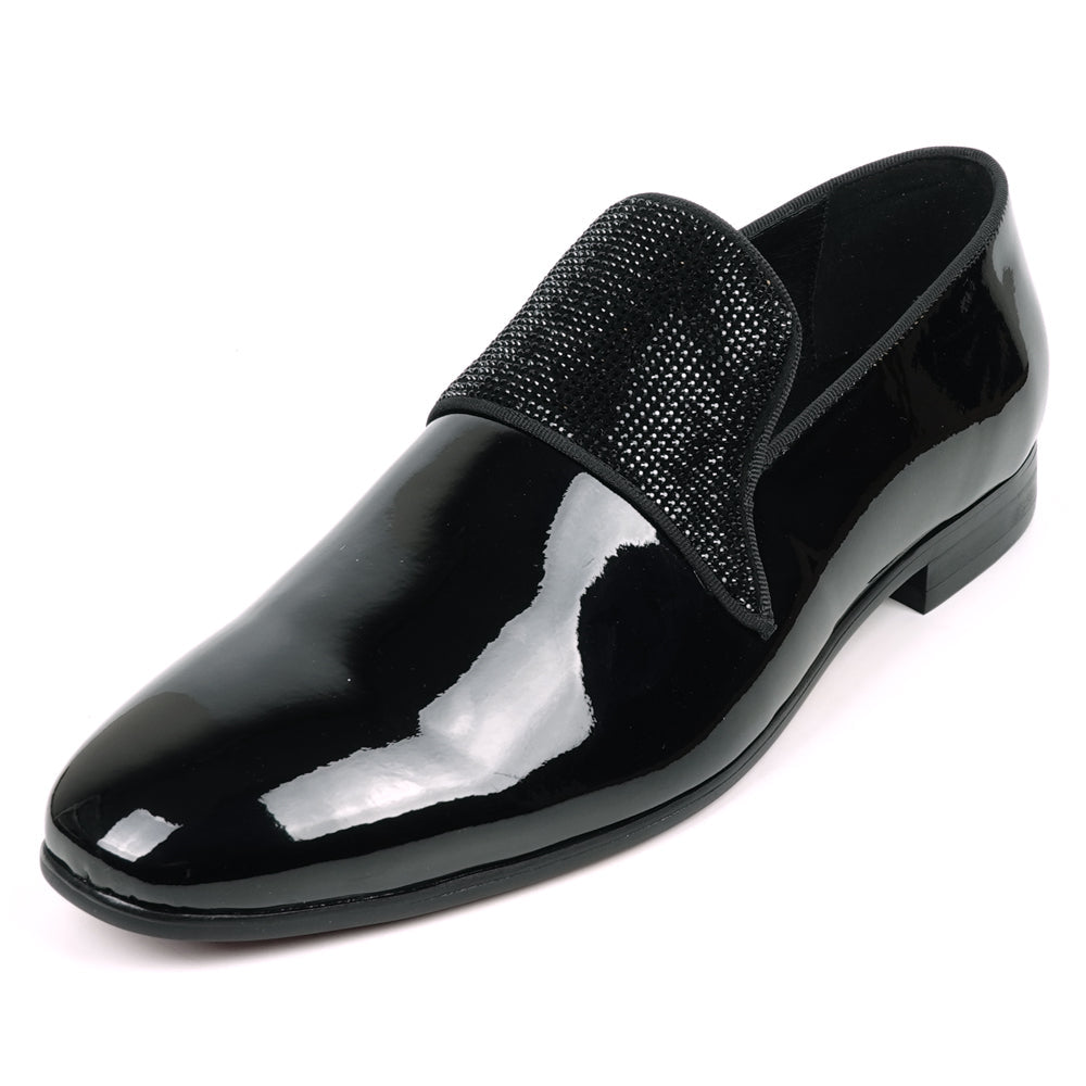 The FI-7549 Black Patent Black Rhinestones Slip on Loafer by Fiesso features a low heel and textured upper, adding refined style to men's formal attire.