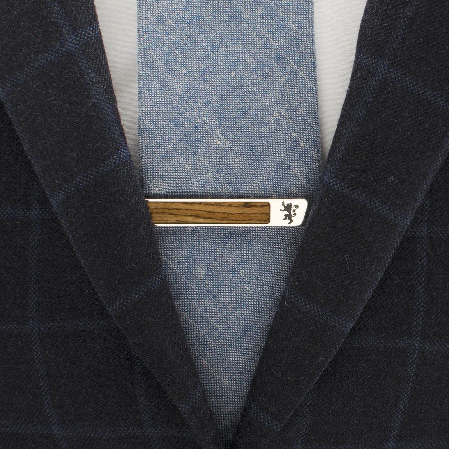 The Game of Thrones Lannister Inlaid Wood Tie Clip by Cufflinks.com, featuring a bold black lion sigil on a wooden inlay, is displayed on a white background.