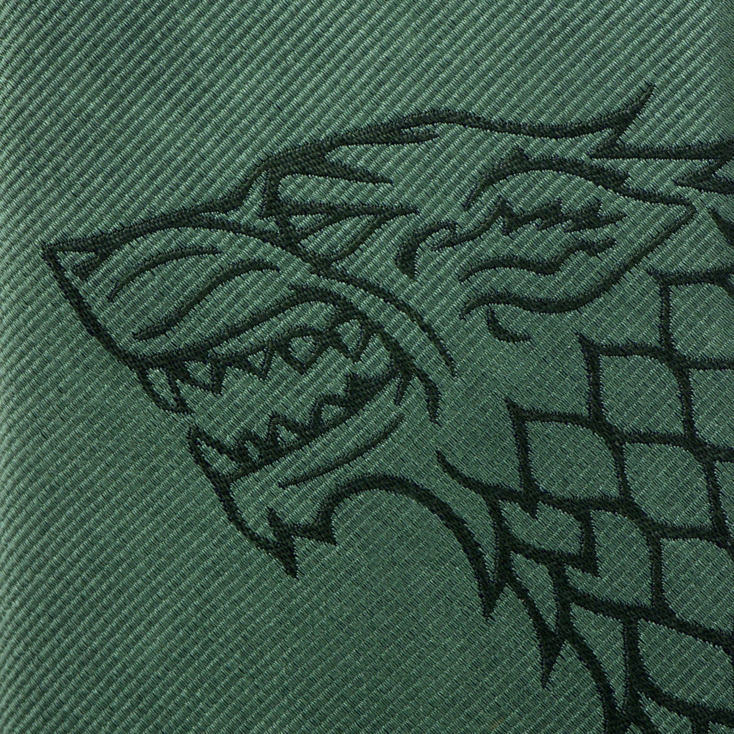 The Game of Thrones Stark Direwolf Green Men's Tie by Cufflinks.com features an embroidered direwolf, making it a stylish accessory for any House Stark fan.