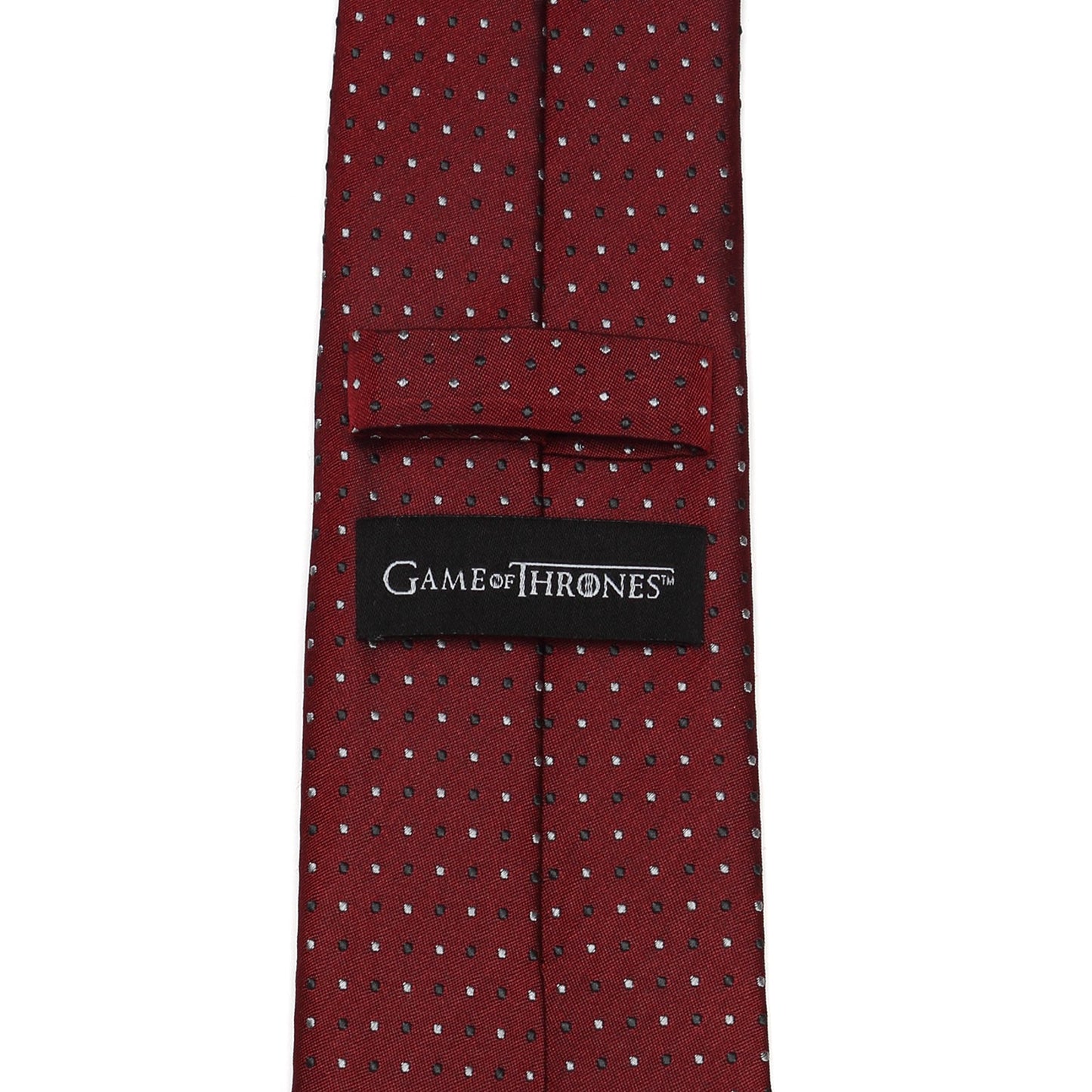 The Game of Thrones Targaryen Dragon Sigil Men's Tie by Cufflinks.com is a rolled-up red tie featuring small white polka dots and a black dragon emblem on the front.