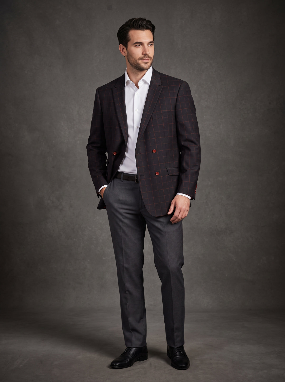 The Inserch Blazer 555-01 Black, exclusively available in size 3XL, features a slim fit design with striking red buttons and a subtle grid pattern, elegantly showcased on a wooden floor.
