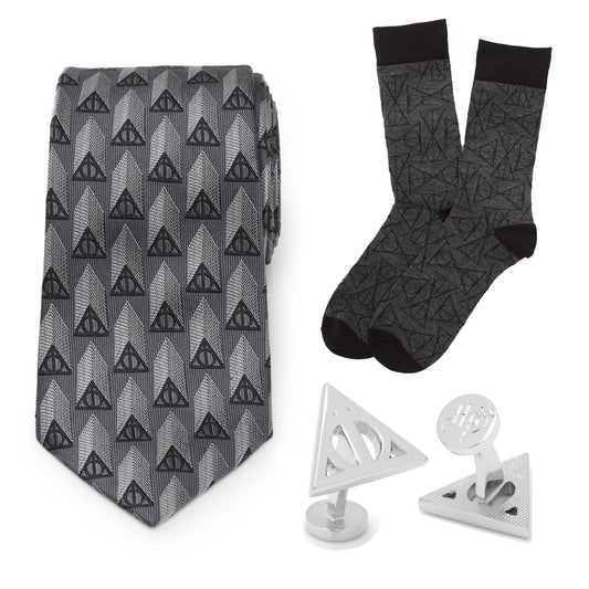 The Harry Potter Deathly Hallows Gray Necktie Gift Set by Cufflinks.com includes a tie, socks, and cufflinks with a geometric triangle design—an ideal Wizarding World gift for any Harry Potter fan.