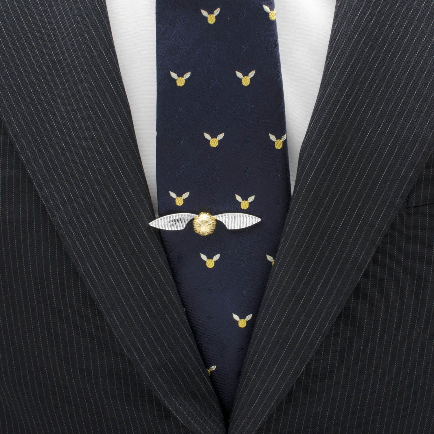 The Harry Potter Golden Snitch Tie Clip from Cufflinks.com features engraved branding on the flat top, capturing magical detail—ideal for fans wanting to add a touch of wizardry to their daily look.