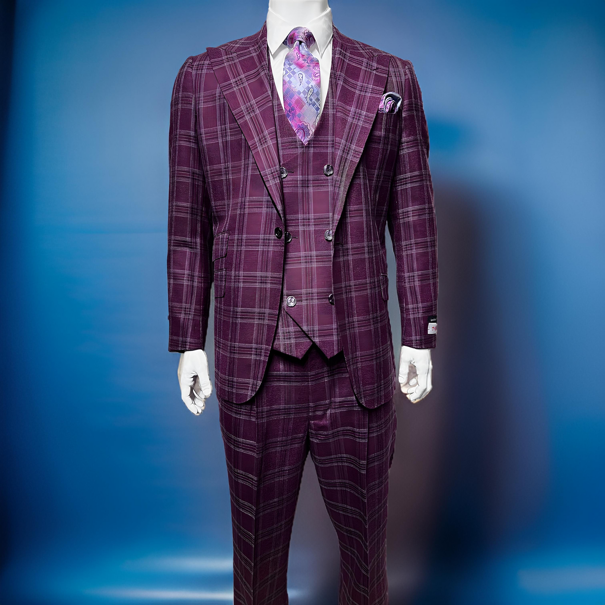 An older man stands against a plain background, wearing the Tiglio Rosso Orvietto Burgundy / Grey TL6336 suit with a matching vest, white shirt, and floral tie, showcasing the classic wide leg fit typical of Tiglio Rosso.