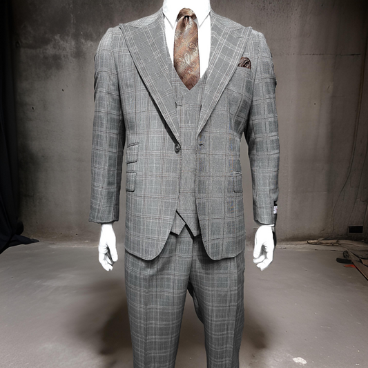A Tiglio Rosso Orvietto Taupe/Brown Plaid TL5203 suit is shown on a mannequin with a brown patterned tie against a plain, industrial-style background.