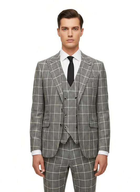 A person stands facing forward, wearing the Tiglio Luxe Green and Navy Glens Plaids Prosecco Modern Fit Pure Wool Suit & Vest TL2715 by Tiglio Luxe, paired with a crisp white shirt and black tie, set against a plain white background.