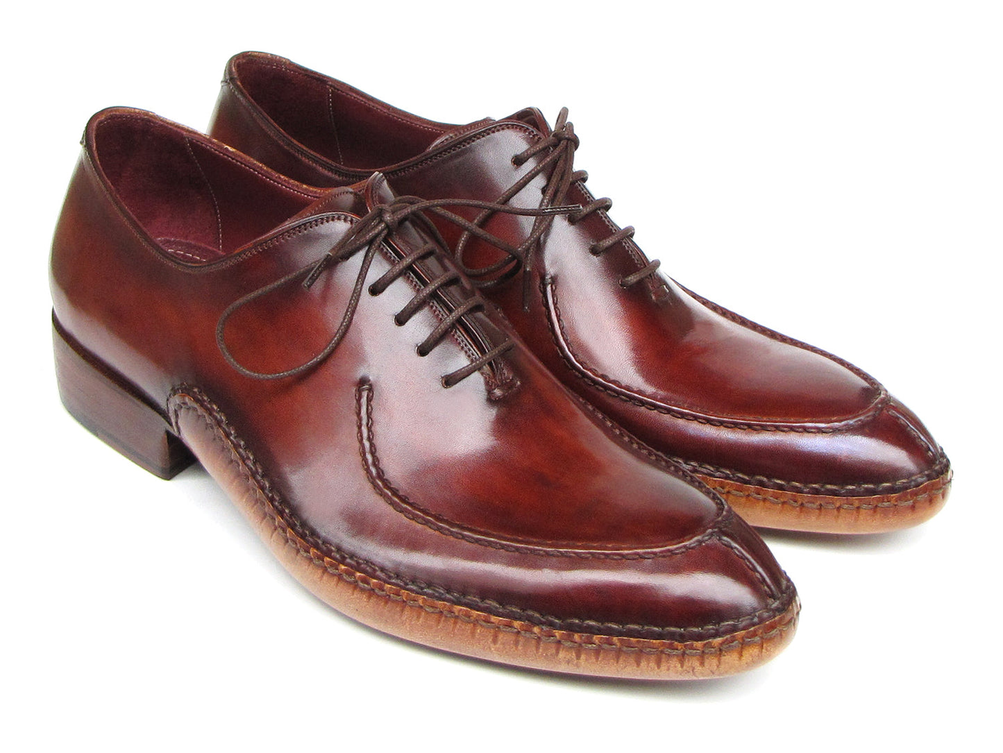 The Paul Parkman Side Handsewn Split-toe Burgundy Oxfords - 054-BUR feature polished hand-painted leather, lace-up design, and elegant stitching details for a refined men's footwear look.
