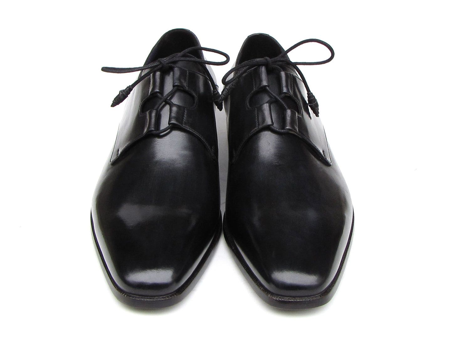 A pair of Paul Parkman Ghillie Lacing Plain Toe Black Shoes (076-BLK)—one shoe stands upright while the other rests on its side.