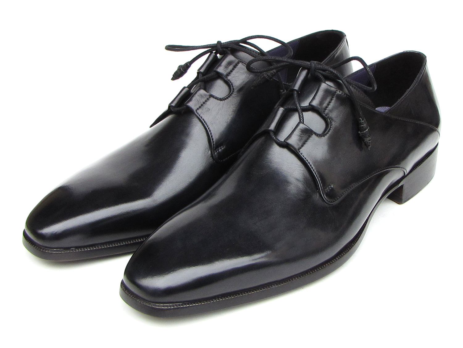 A pair of Paul Parkman Ghillie Lacing Plain Toe Black Shoes (076-BLK)—one shoe stands upright while the other rests on its side.
