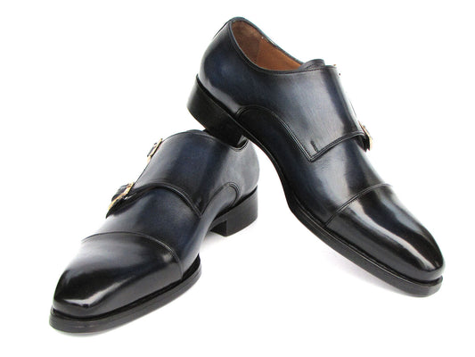 A pair of Paul Parkman Goodyear welted double monkstrap shoes in navy, featuring silver buckles, resting on a white background.