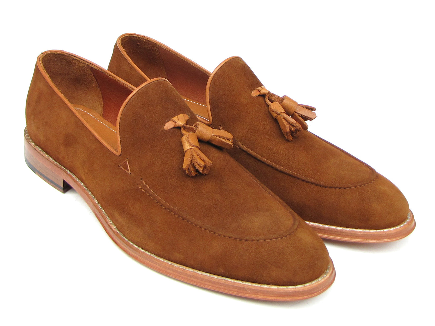 Paul Parkman Tassel Loafers Tobacco Suede - 087-TAB by Paul Parkman: one loafer stands upright while the other lies on its side, showing the leather sole.