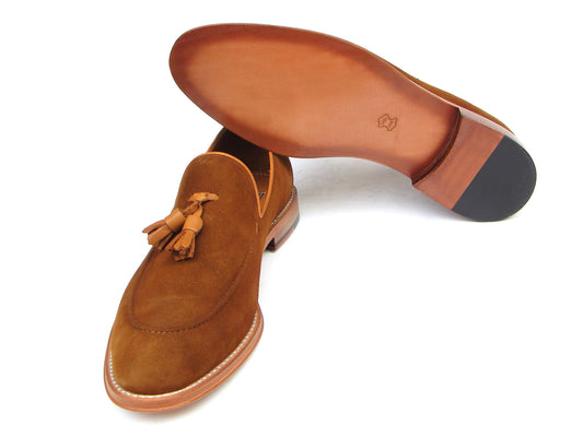 Paul Parkman Tassel Loafers Tobacco Suede - 087-TAB by Paul Parkman: one loafer stands upright while the other lies on its side, showing the leather sole.