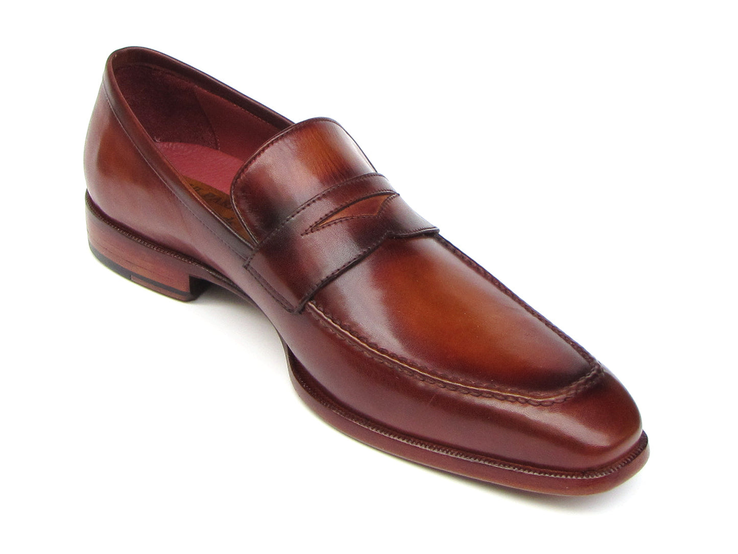 The Paul Parkman Penny Loafer Tobacco & Bordeaux Hand-Painted Shoes (067-BRD) for men feature brown leather, visible stitching, a wooden heel, and a branded insole, combining classic style with expert craftsmanship.