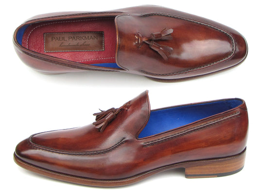 The Paul Parkman Tassel Loafer Brown - 073-BRD features hand-painted brown Italian calfskin, blue inner lining, wooden soles, and the "Paul Parkman handmade shoes" label for timeless elegance.