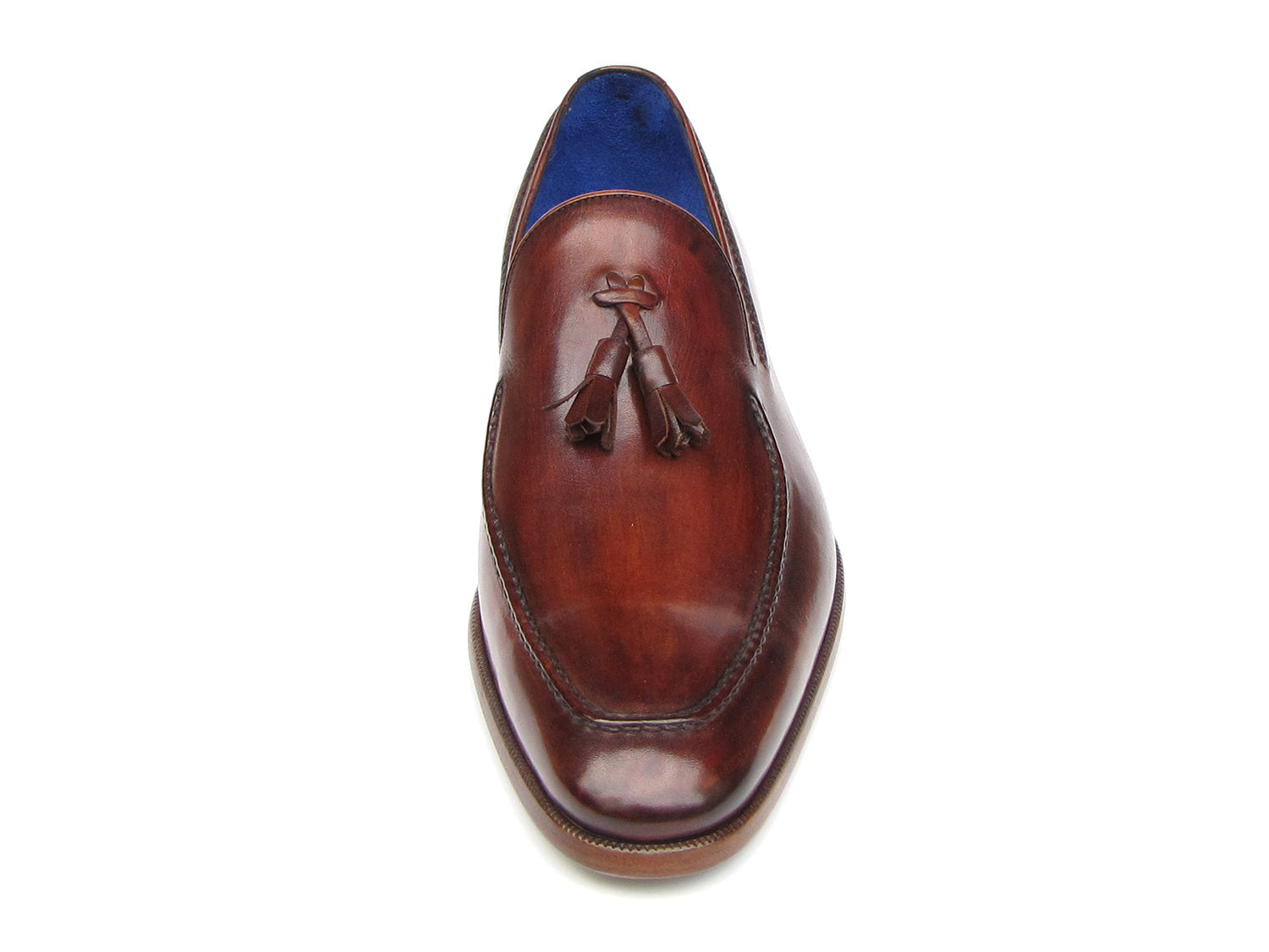 The Paul Parkman Tassel Loafer Brown - 073-BRD features hand-painted brown Italian calfskin, blue inner lining, wooden soles, and the "Paul Parkman handmade shoes" label for timeless elegance.