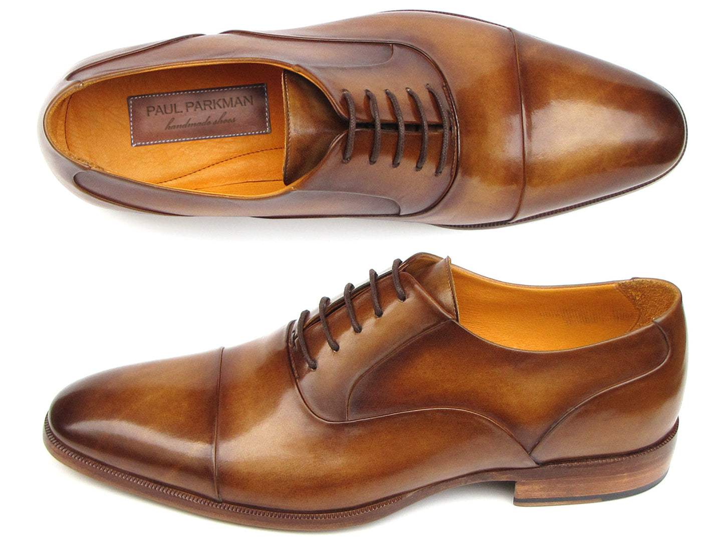 Paul Parkman Captoe Oxfords Brown Leather - 074-CML by Paul Parkman, shown from top and side views, are handmade men's dress shoes in brown leather with dark brown laces and a leather sole.