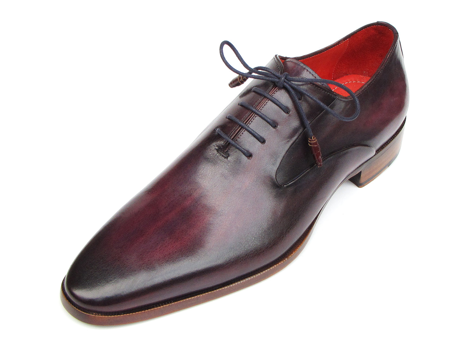 A single Paul Parkman Plain Toe Oxfords Purple Shoe for men, handmade with a sleek design, red interior lining, and brown wooden heel, viewed from an angle.