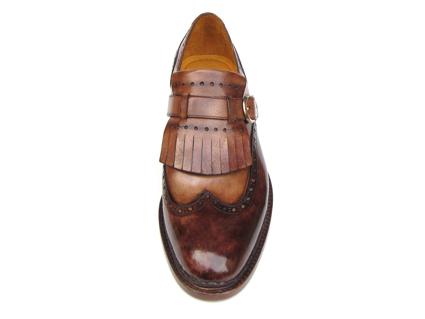 The Paul Parkman Wingtip Monkstraps Brown - 060-BRW features brown leather, decorative perforations, and a fringed kiltie detail. Handcrafted with Goodyear welted construction, this men's dress shoe is shown at a slight angle.
