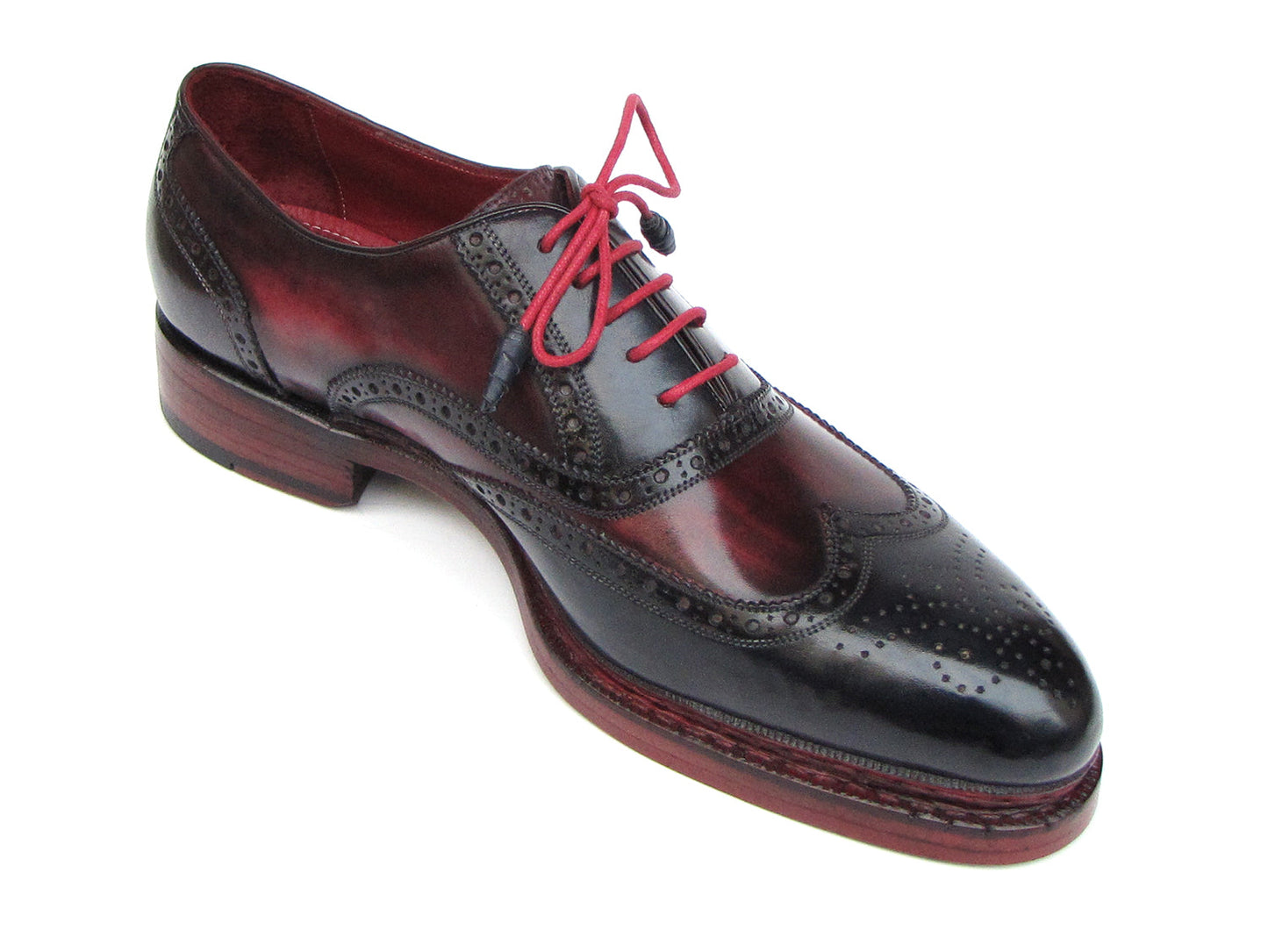 Paul Parkman Triple Leather Sole Wingtip Brogues in navy and red, featuring intricate brogue detailing, bold red interior lining, and stylish red laces.