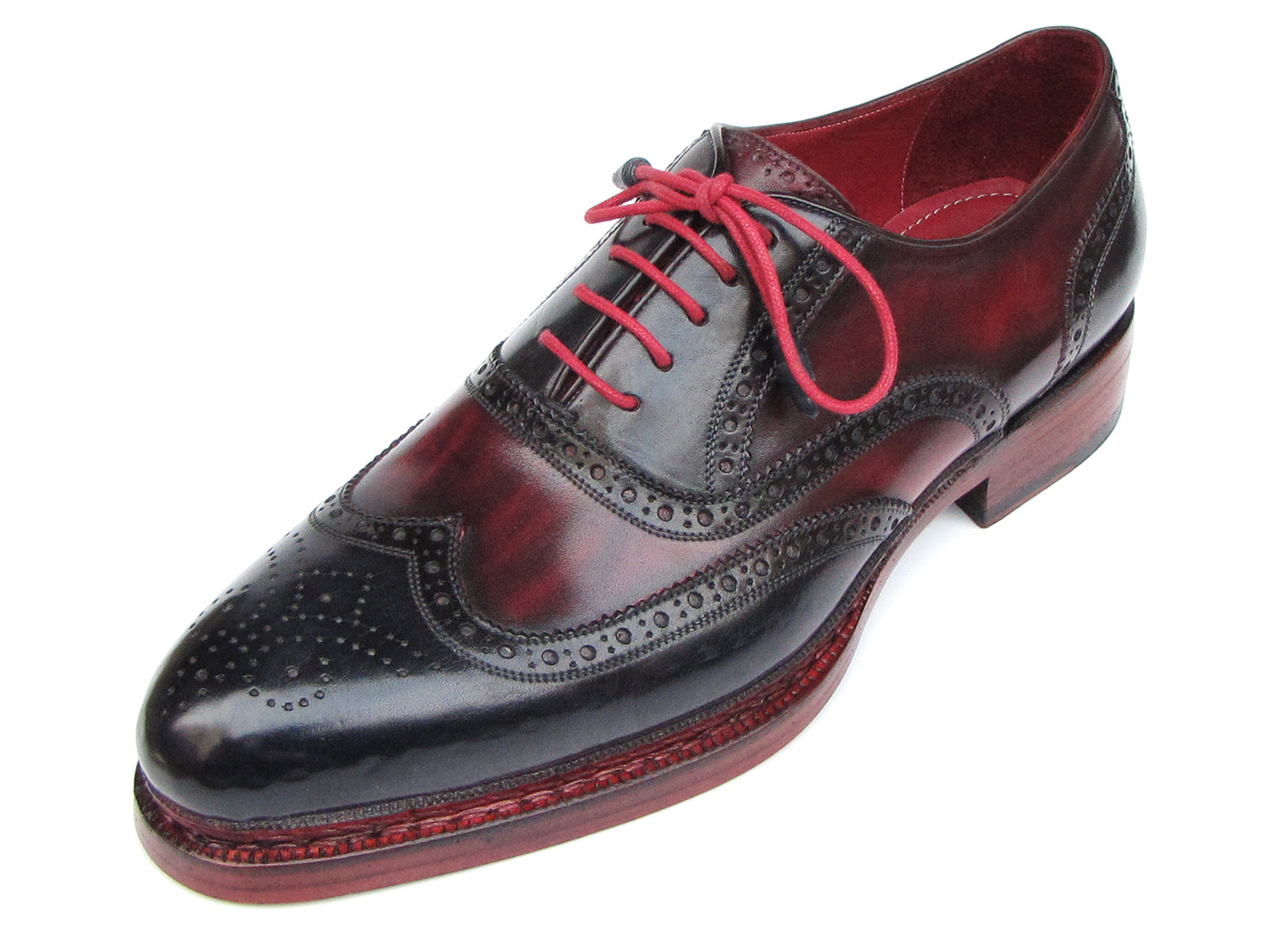 Paul Parkman Triple Leather Sole Wingtip Brogues in navy and red, featuring intricate brogue detailing, bold red interior lining, and stylish red laces.