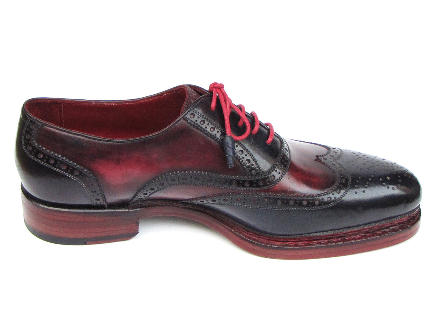 Paul Parkman Triple Leather Sole Wingtip Brogues in navy and red, featuring intricate brogue detailing, bold red interior lining, and stylish red laces.