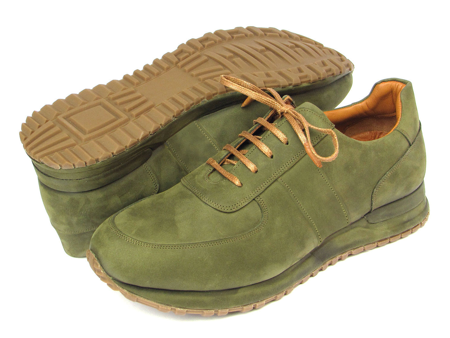 Discover the pinnacle of men's luxury fashion with Paul Parkman Men's Green Nubuck Sneakers - LP207GRB. These sneakers boast a refined green nubuck exterior, complemented by brown laces and a beige sole. Meticulously crafted on a made-to-order basis, each pair ensures a distinctive touch for every sophisticated gentleman.