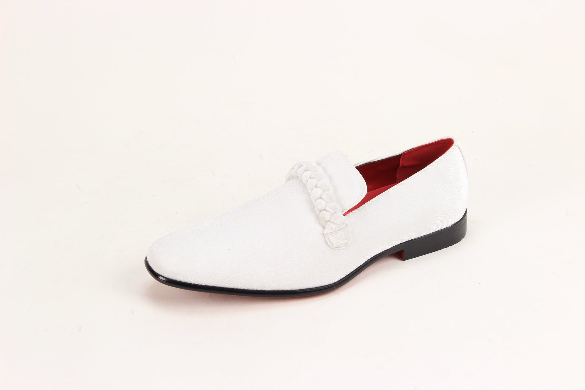 The AFTER MIDNIGHT After Midnight 7067 White Dress Shoe is a single white suede loafer with a braided strap, plain toe, black sole, and red interior lining.