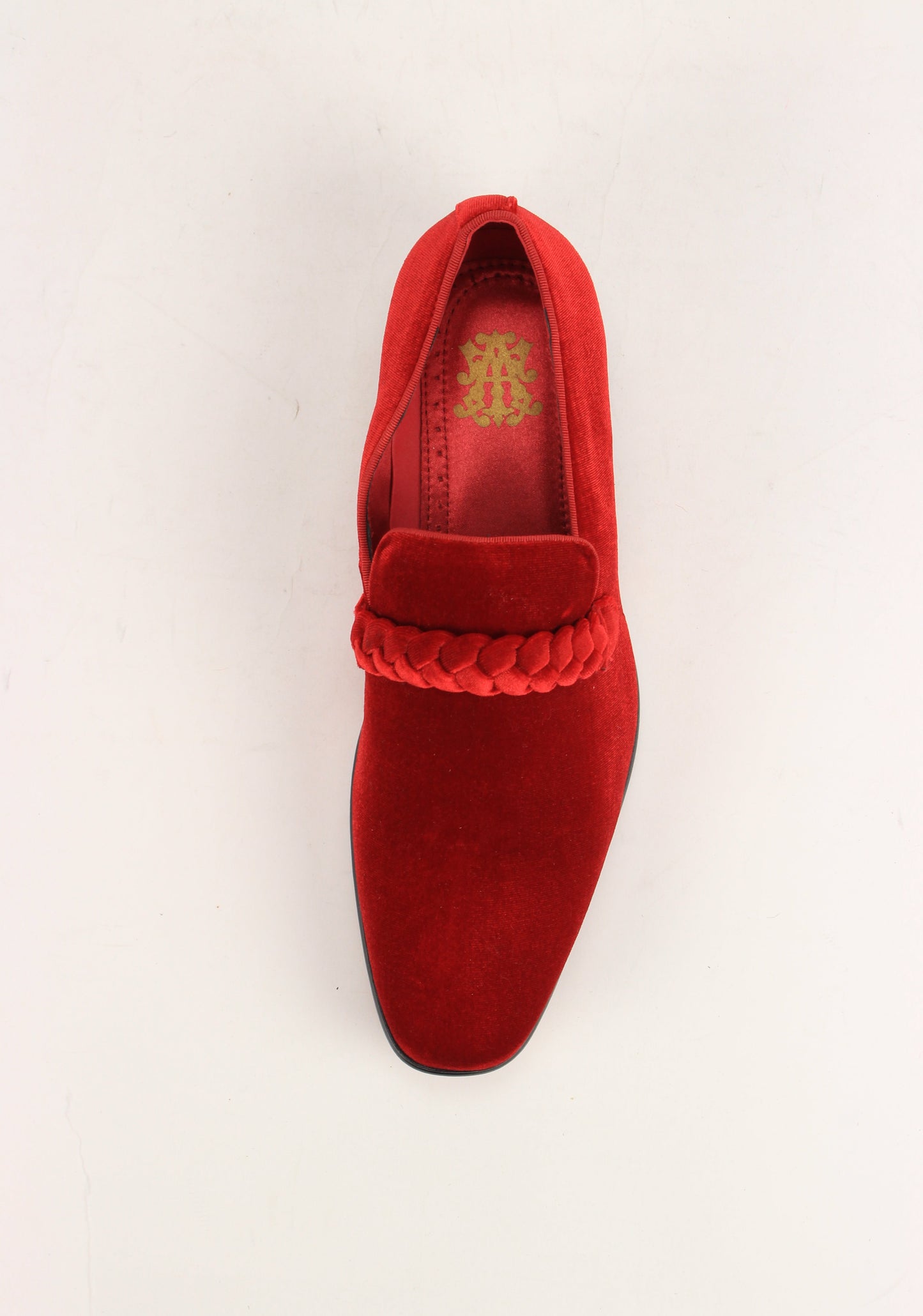 The AFTER MIDNIGHT After Midnight 7067 Fire Red Dress Shoe features a red velvet upper, braided strap detail, low black heel, and pointed toe, shown here as a single loafer against a white background.