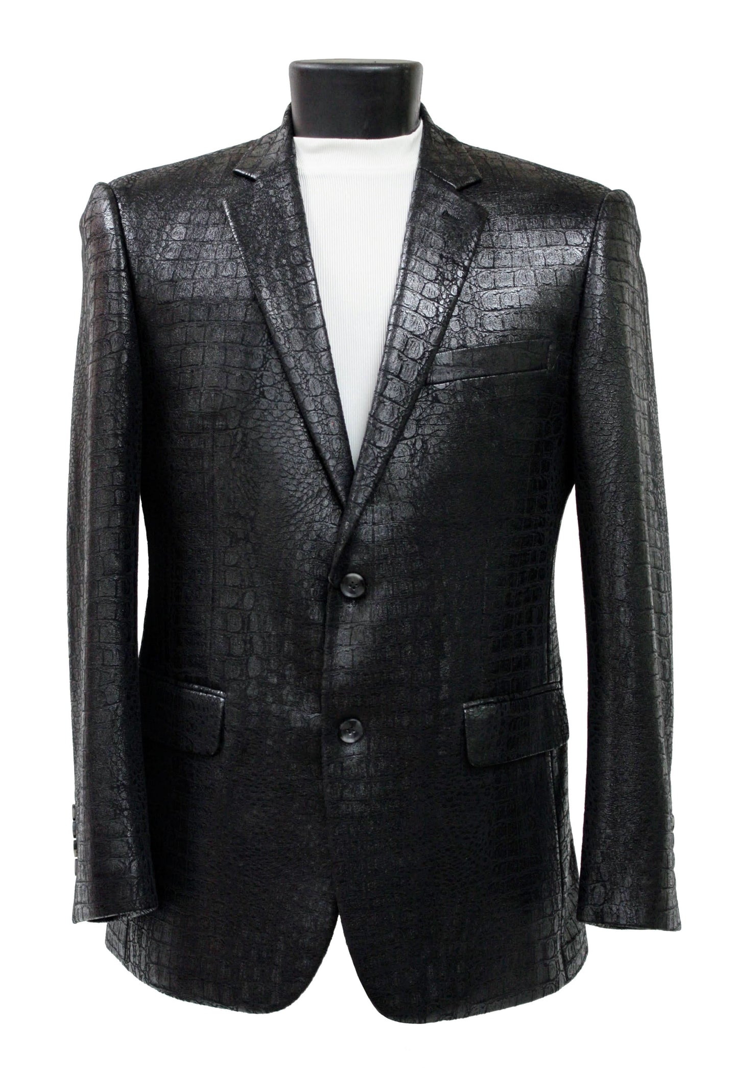The Bassiri Blazer J1041-Black by Bassiri features a striking crocodile-textured pattern, shown on a mannequin dressed in a crisp white turtleneck.