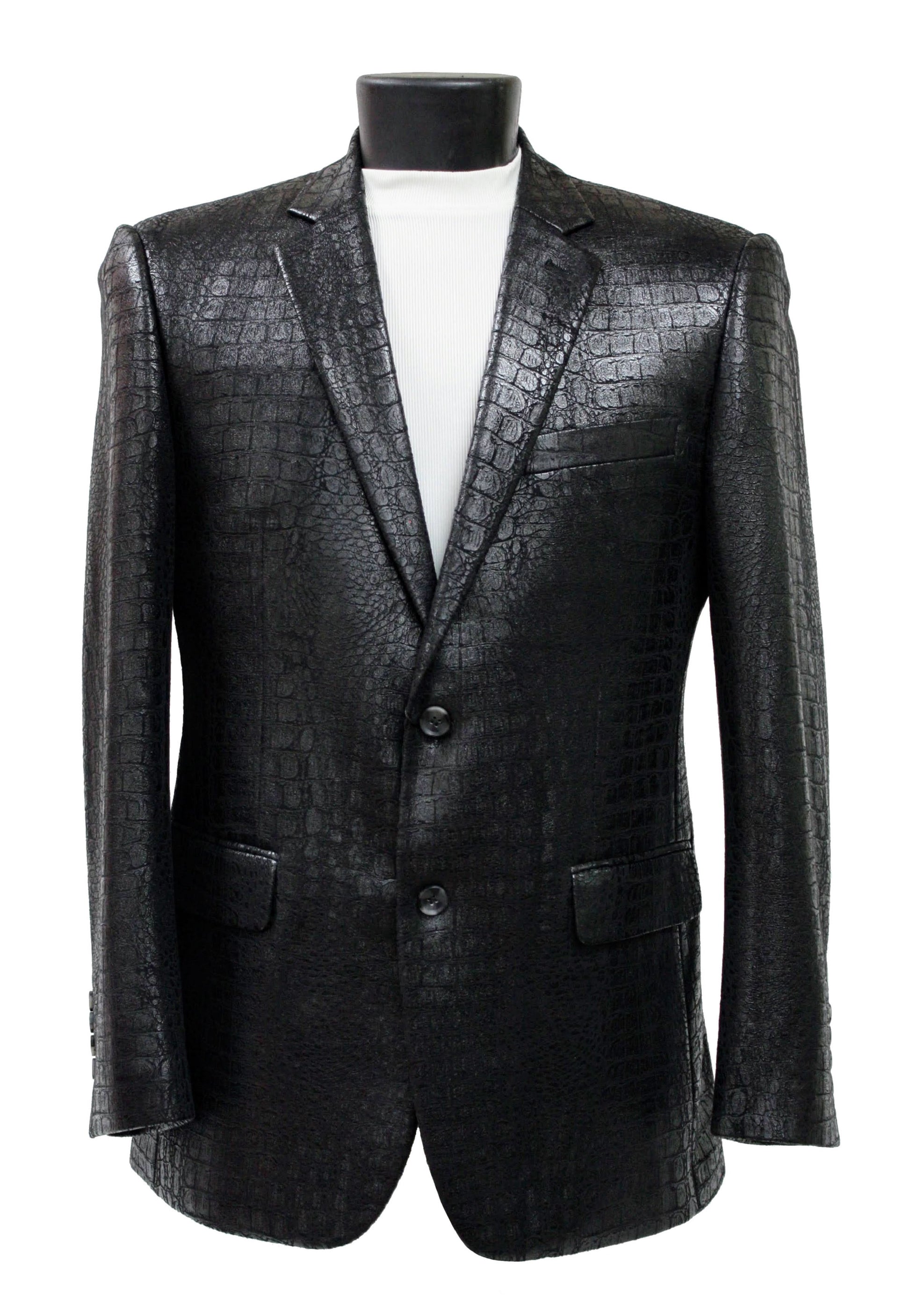 The Bassiri Blazer J1041-Black by Bassiri features a striking crocodile-textured pattern, shown on a mannequin dressed in a crisp white turtleneck.
