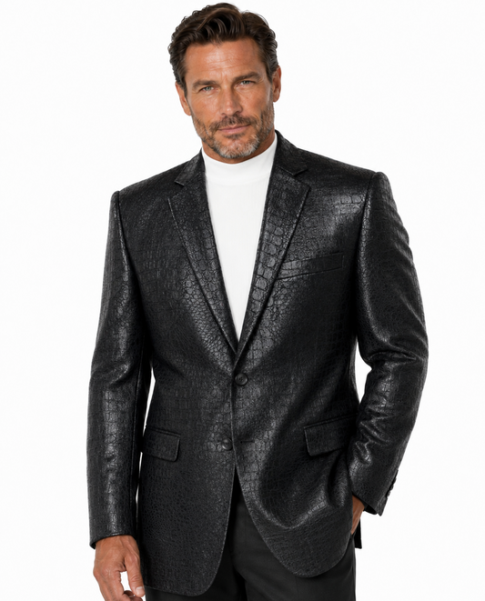 The Bassiri Blazer J1041-Black by Bassiri features a striking crocodile-textured pattern, shown on a mannequin dressed in a crisp white turtleneck.