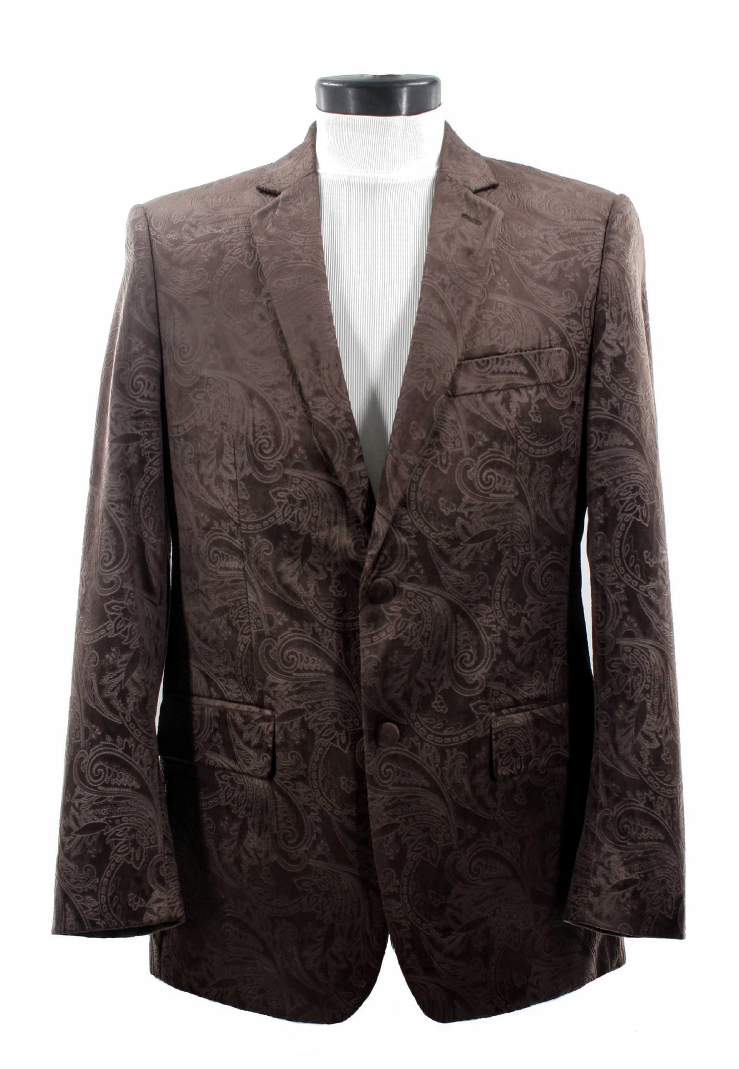 The Bassiri Blazer J1044-Brown is beautifully exhibited on a mannequin, elegantly paired with a white turtleneck. Its brown paisley pattern adds sophistication and flair to any wardrobe.