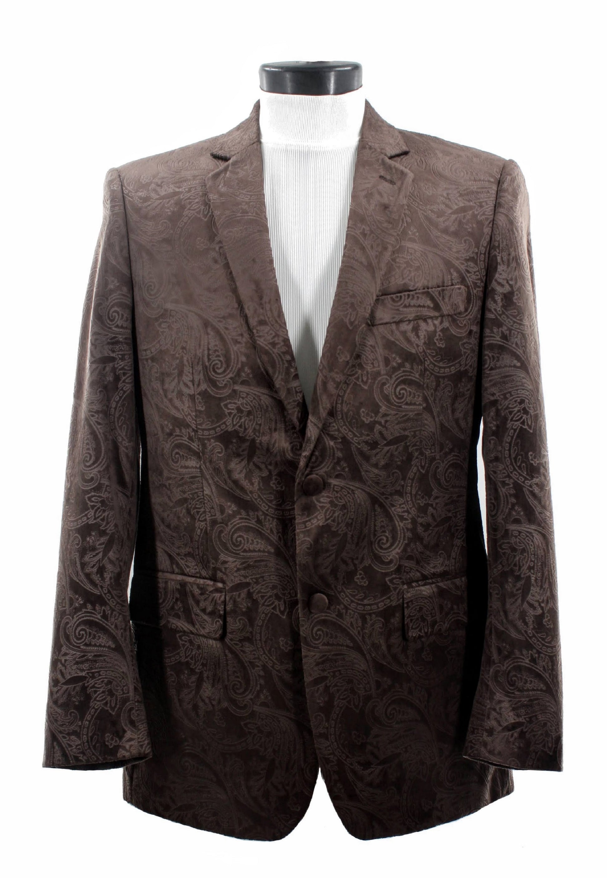 The Bassiri Blazer J1044-Brown is beautifully exhibited on a mannequin, elegantly paired with a white turtleneck. Its brown paisley pattern adds sophistication and flair to any wardrobe.