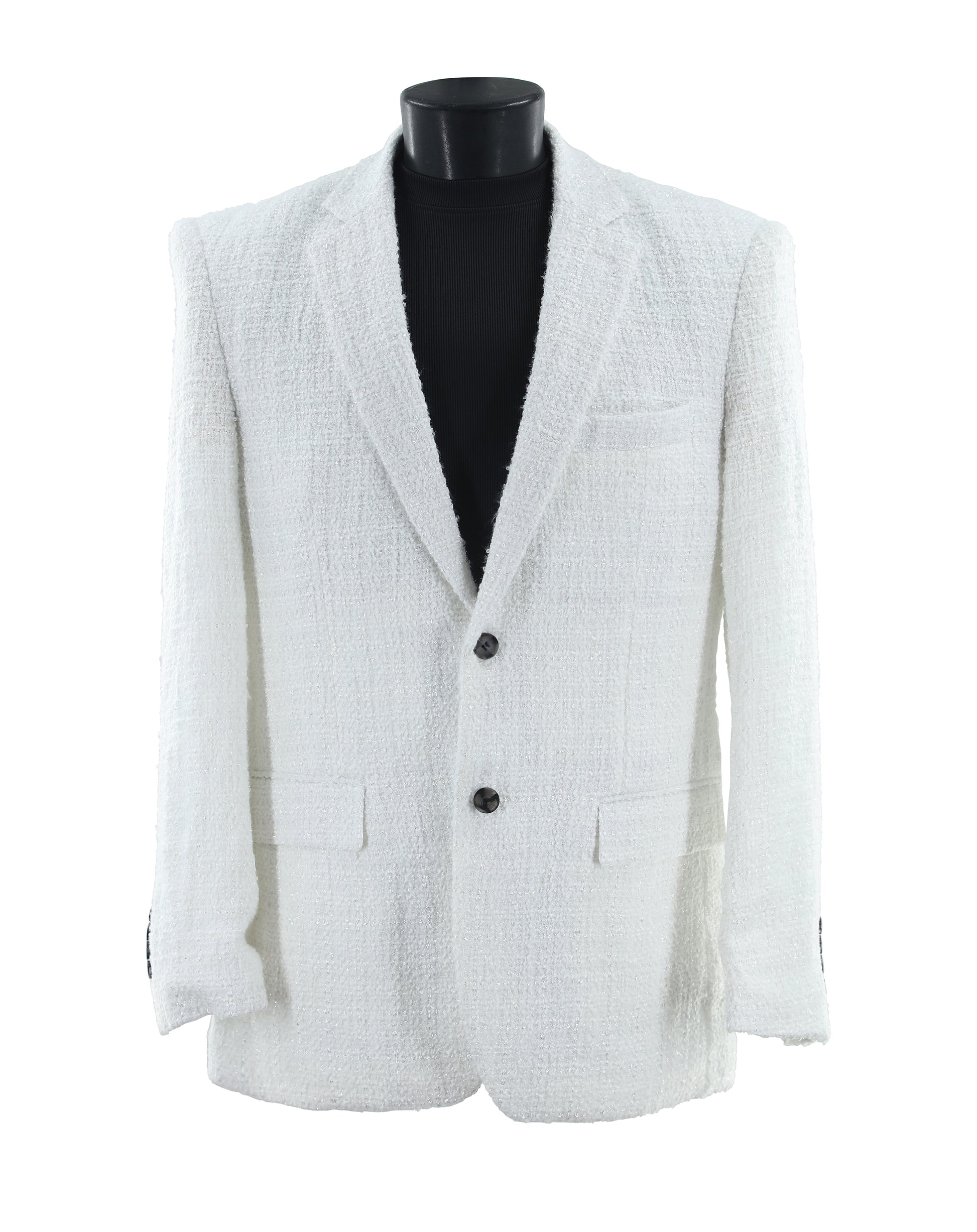 The Bassiri Blazer J1045-White by Bassiri features a textured white fabric, two buttons, notched lapels, and front flap pockets, shown on a black mannequin torso.