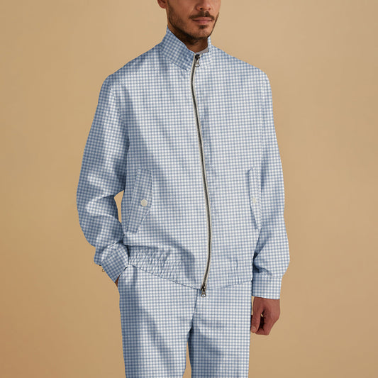 A man wearing the Inserch Linen Houndstooth Jacket JS269-00014 Lt. Blue by Inserch with matching pants stands against a plain beige background.