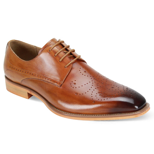 Giovanni Joel Tan Leather Shoes by GIOVANNI are crafted in brown leather with brogue detailing, featuring a closed lacing system and an elegant medallion design on the vamp, complemented by a wooden sole.