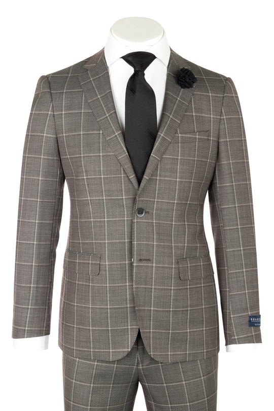 The Canaletto Porto Slim Fit Taupe Gray Windowpane Pure Wool Suit by GUABELLO Cloth (LG8878F/435/3) is shown with a black tie, white dress shirt, and black lapel pin on a headless mannequin—a modern luxury men's look.