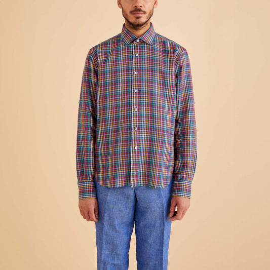 An individual in an Inserch LS Linen Gingham Shirt LS2917-00066 Multi and light blue pants poses against a beige backdrop.