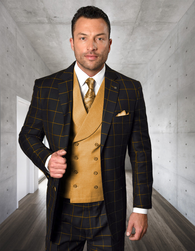 A man in Statement Clothing's modern-fit LUCCA-BLACK-TAUPE suit with an Italian wool vest, matching tie, and pocket square stands in a sleek hallway with concrete walls and a wooden floor.