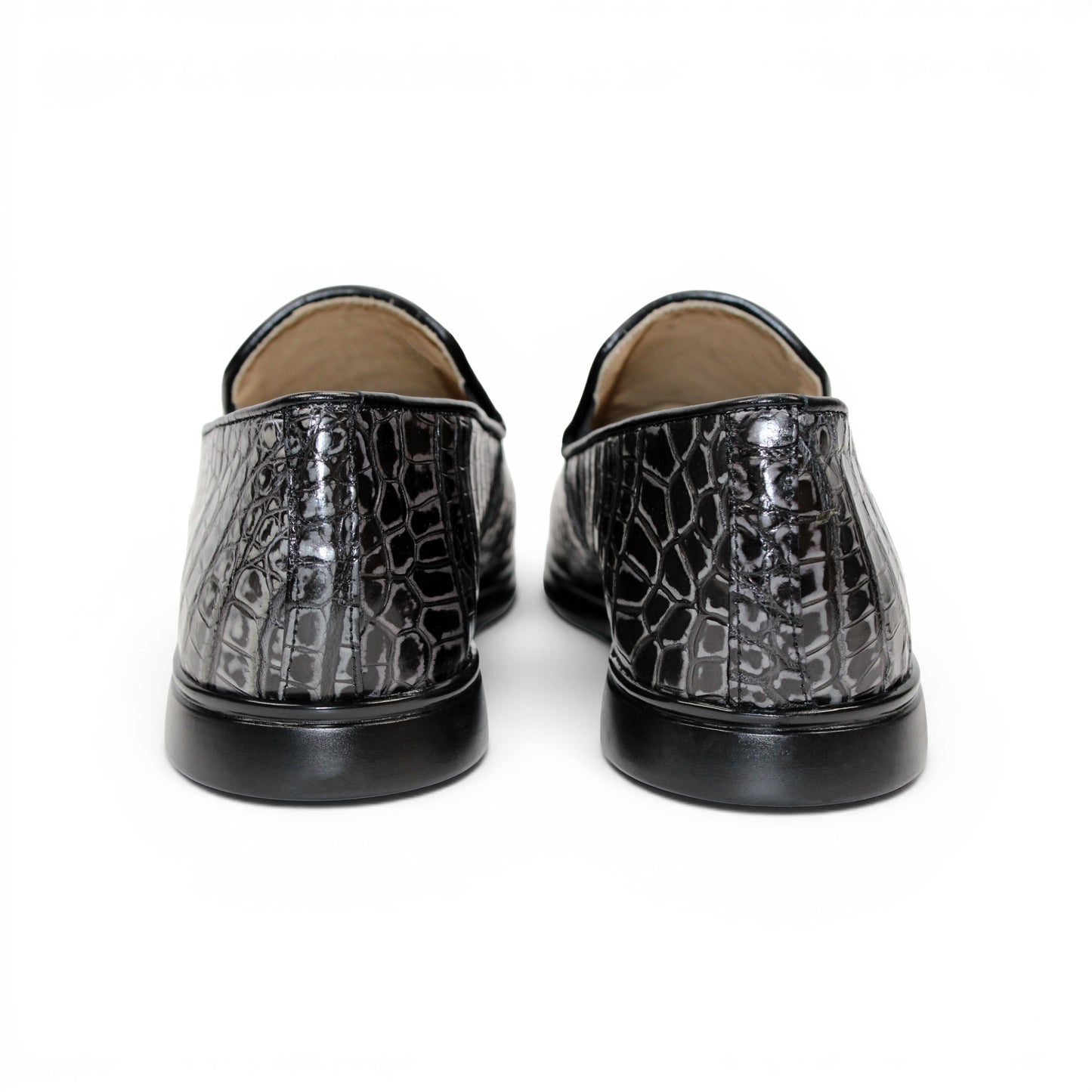The Fennix Lance Nero/Grigio by Fennix of Italy is a black crocodile-pattern leather loafer, Italian-crafted for sophistication with a low heel and rounded toe, displayed in profile against a plain white background.