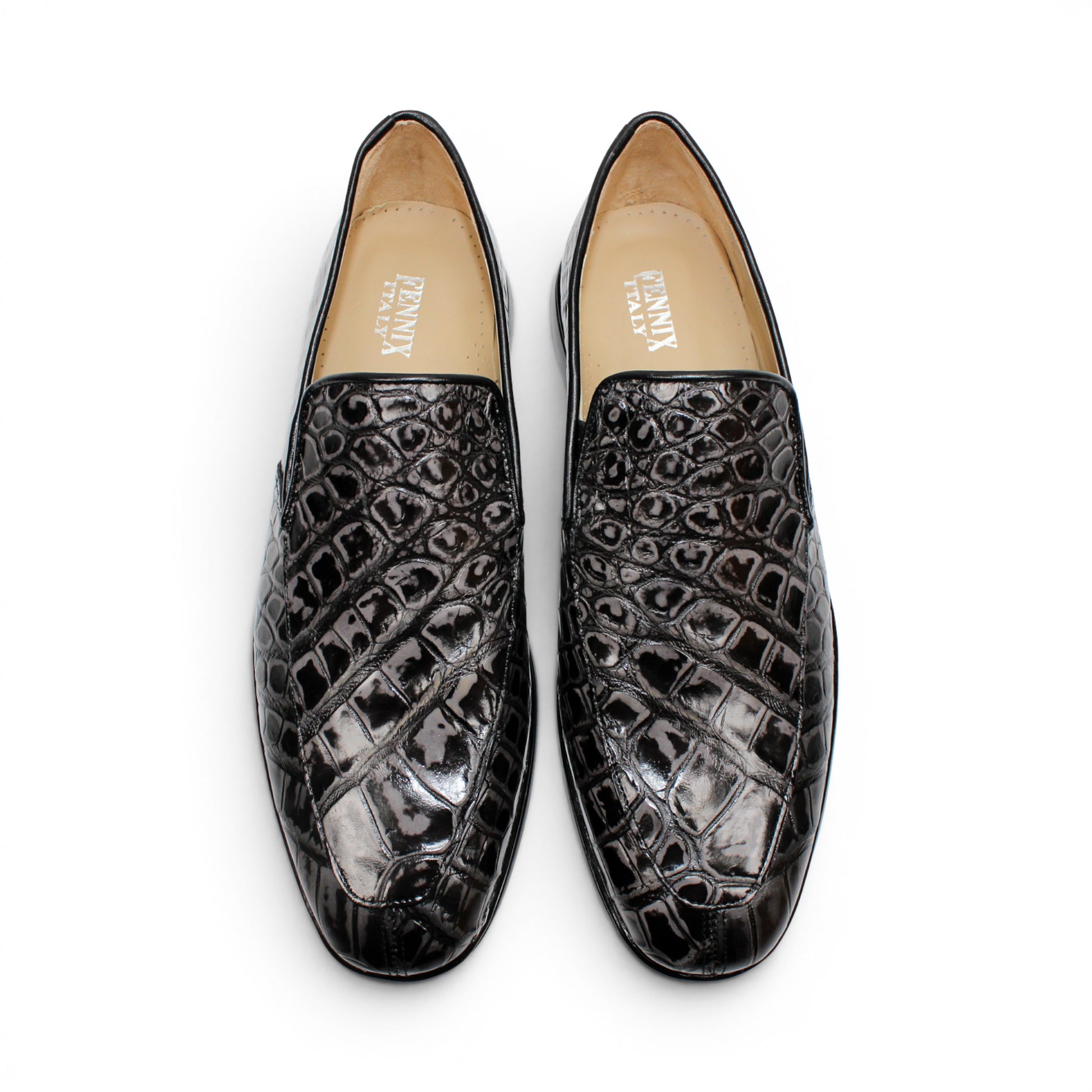 The Fennix Lance Nero/Grigio by Fennix of Italy is a black crocodile-pattern leather loafer, Italian-crafted for sophistication with a low heel and rounded toe, displayed in profile against a plain white background.
