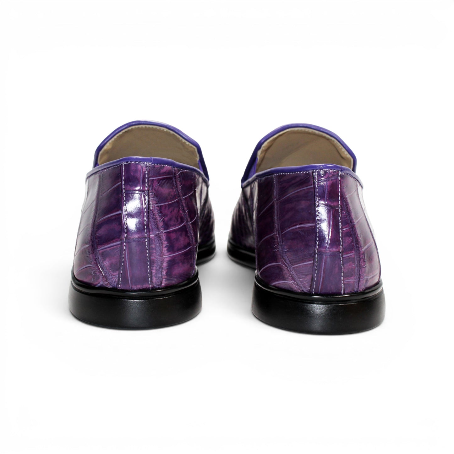 A single Fennix Lance Purple luxury men’s shoe by Fennix of Italy, crafted from genuine alligator leather with a black sole, is photographed in profile on a white background.