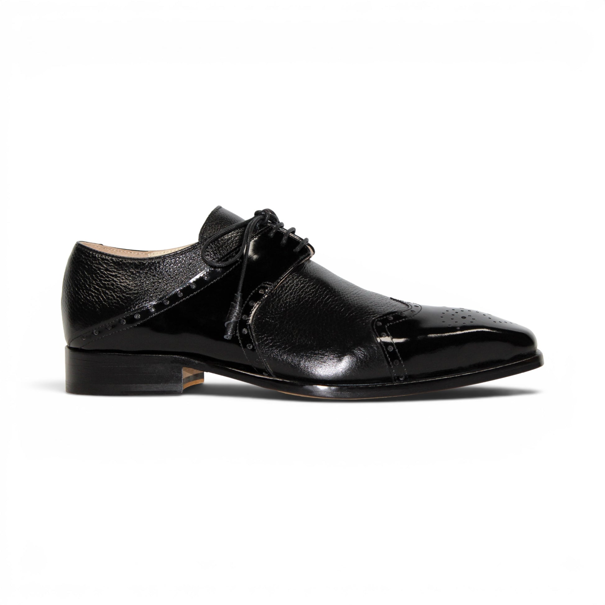 The Emilio Franco Luciano Black by Emilio Franco is an elegant men's dress shoe crafted from premium Italian leather, featuring a closed lacing system, low heel, and decorative perforations on the toe. Shown in profile against a plain white background, this luxury footwear exemplifies refined style.