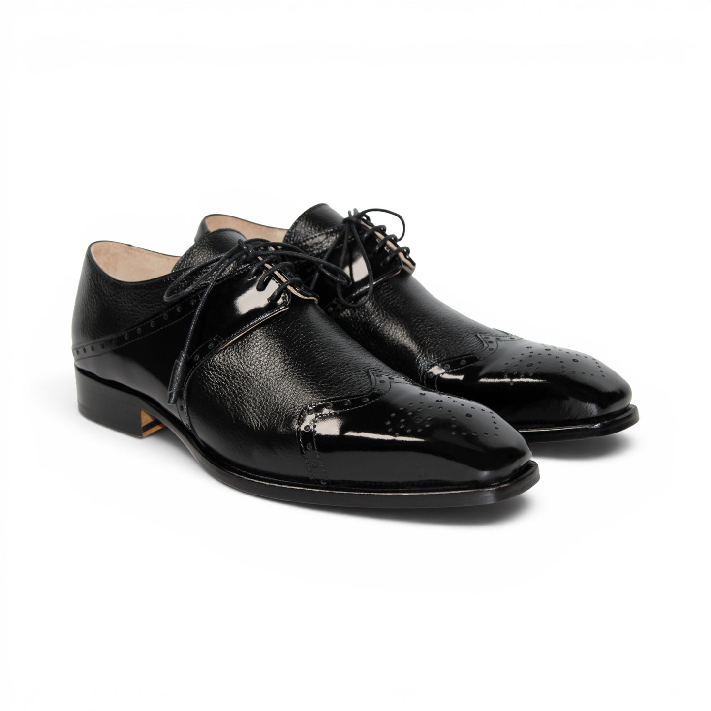 The Emilio Franco Luciano Black by Emilio Franco is an elegant men's dress shoe crafted from premium Italian leather, featuring a closed lacing system, low heel, and decorative perforations on the toe. Shown in profile against a plain white background, this luxury footwear exemplifies refined style.